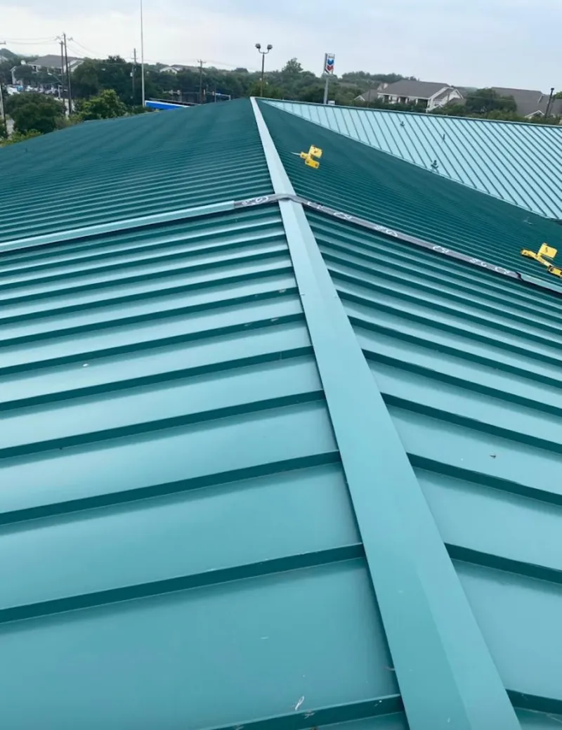 Green commercial metal roof ridge and valley for Metal Roof Repair in Kennewick
