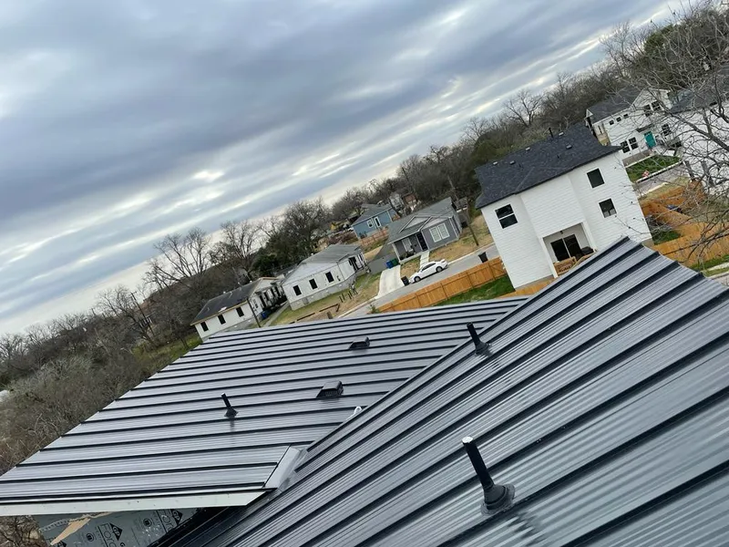 Standing seam metal roof panels with vents for Skylight Repair in Kennewick